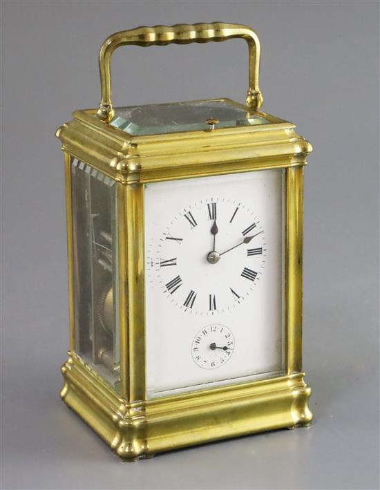 A late 19th century French ormolu quarter repeating carriage alarm clock, 6in.